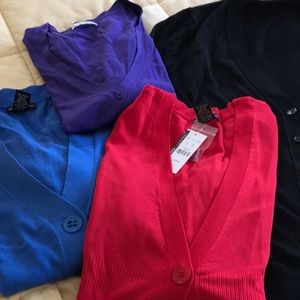 Four button front sweaters.